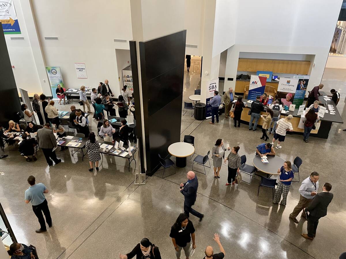 People walk around the Small Business Resource Fair on Wednesday, May 4, 2022, at the Sahara We ...