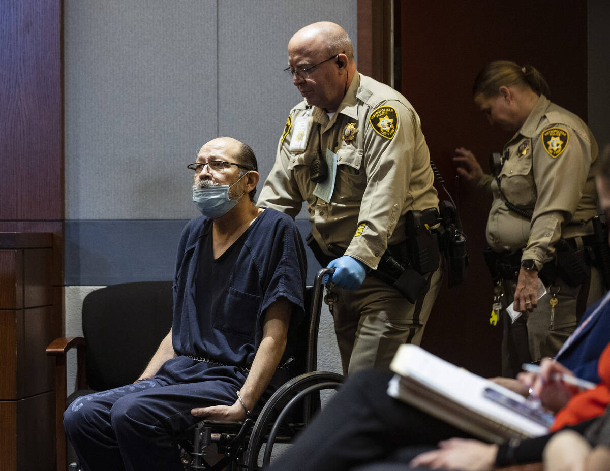 In this April 4, 2022, file photo, Reynaldo Crespin led into the courtroom during his prelimina ...