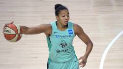 New York Liberty center Kiah Stokes (41) sets up a play during the first half of a WNBA basketb ...