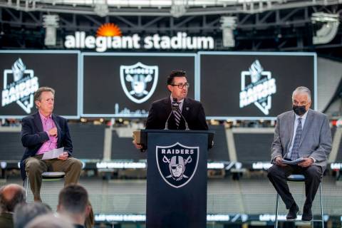 Jeremy Aguero, center, is joined by Maury Gallagher, left, and Gov. Steve Sisolak during a pres ...