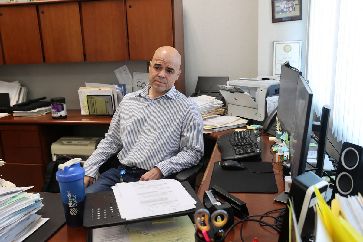 Clark County Public Administrator Robert Telles talks to a reporter in his Las Vegas office Wed ...
