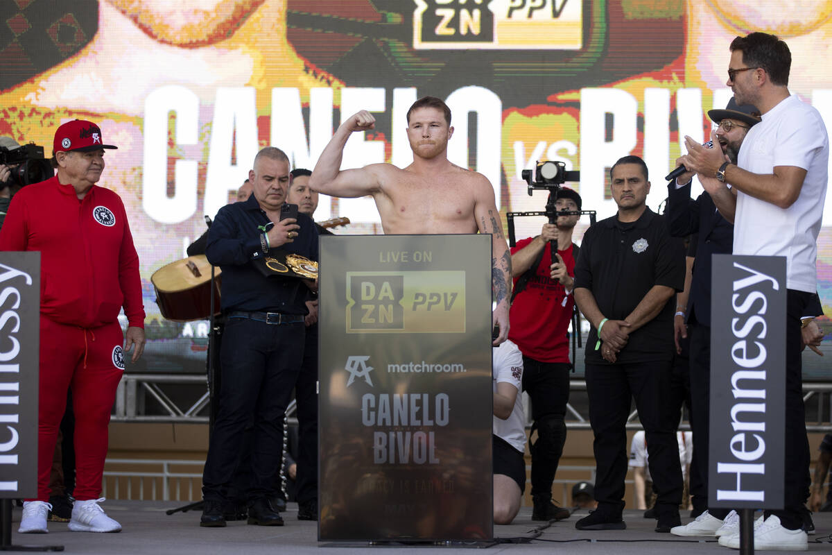 Saul “Canelo” Alvarez stands on a scale during a ceremonial weigh-in event at Tos ...