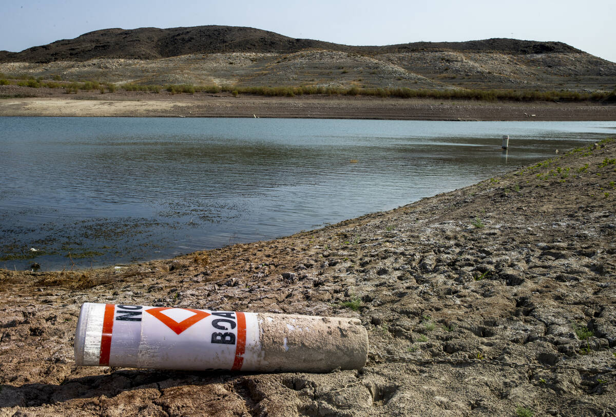 A buoy is seen on the shore at the Lake Mead National Recreation Area on Tuesday, Aug. 17, 2021 ...
