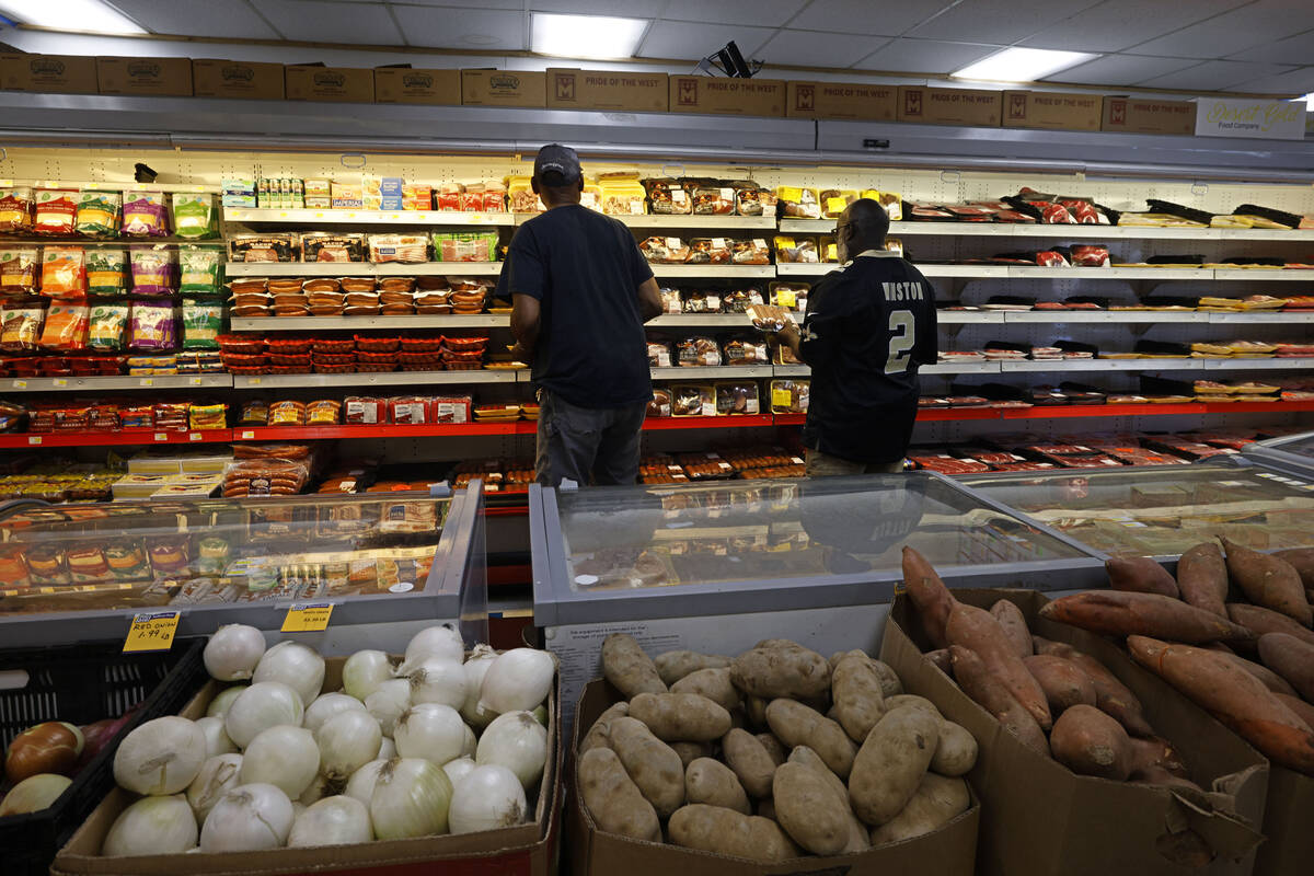 Customers shop at Mario's Westside Market, Friday, May 6, 2022, in Las Vegas. (Chitose Suzuki / ...