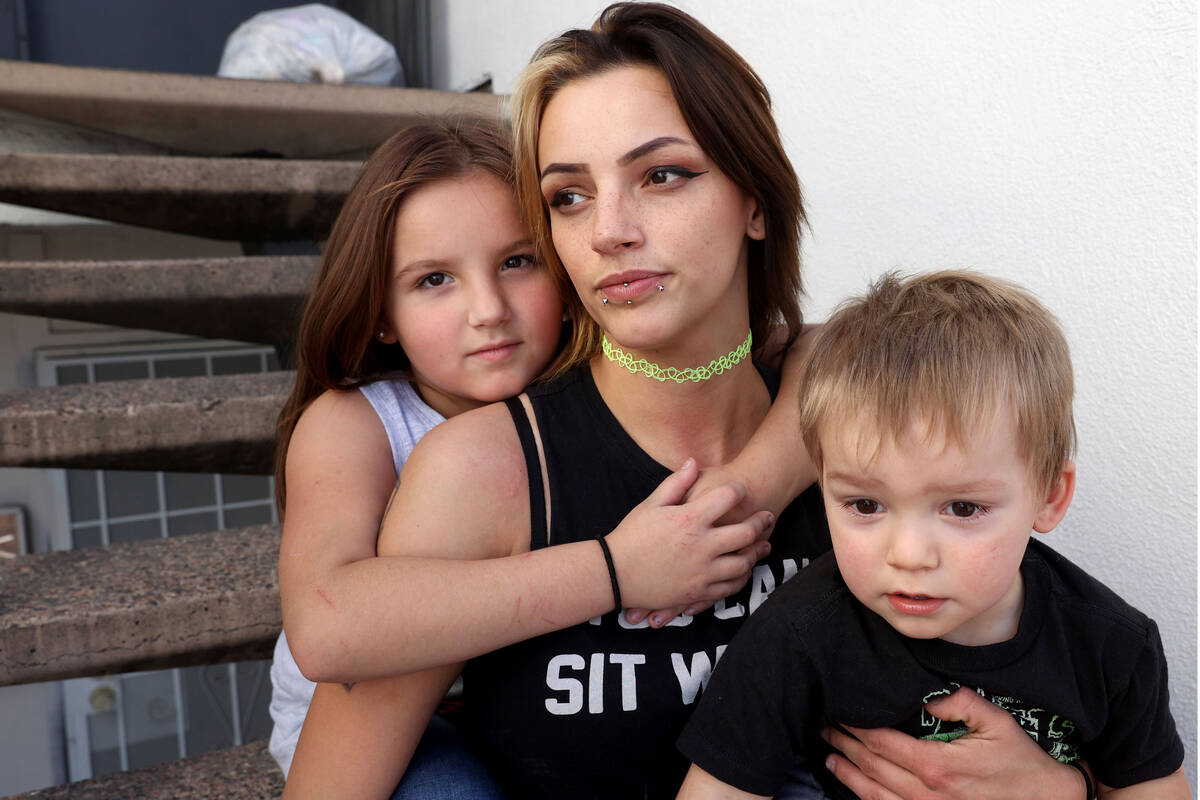 Eliza Paige Trowbridge with her children Velocidy Trowbridge, 7, and Jesse Charles, 22 months, ...