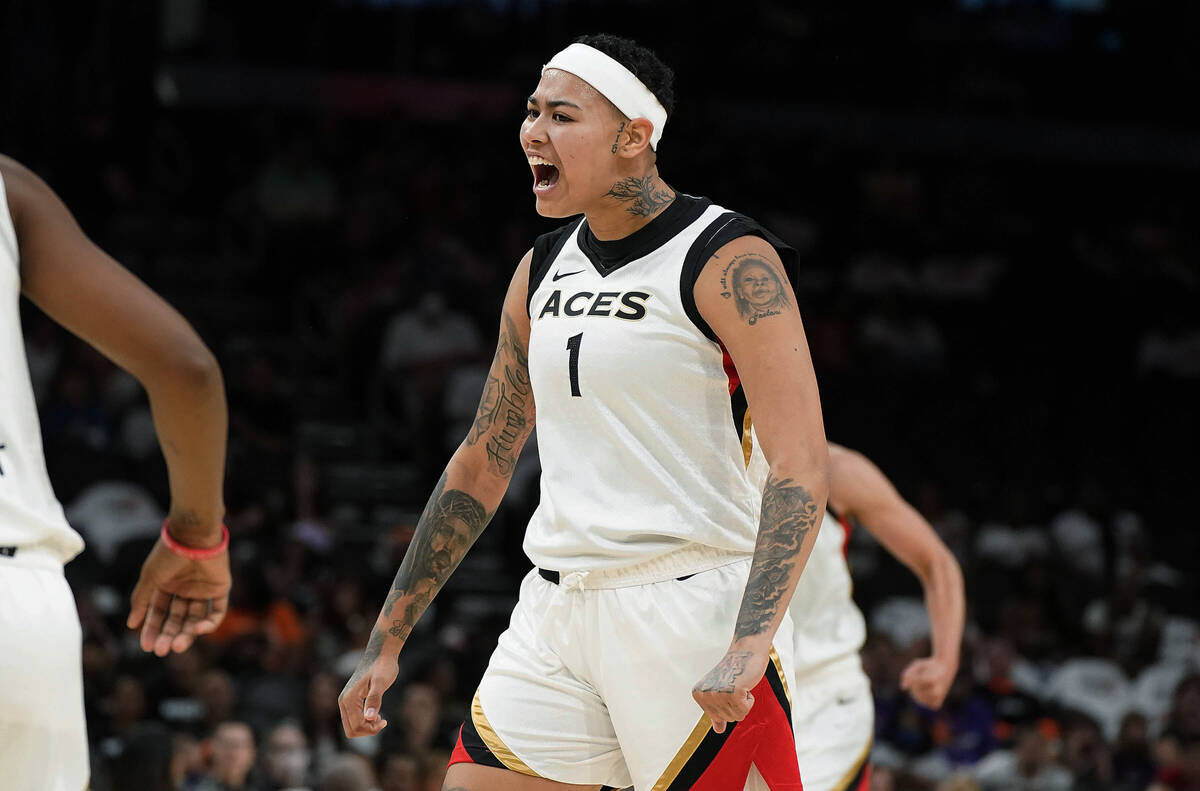 Las Vegas Aces' Kierstan Bell (1) celebrates during the second half of the team's WNBA basketba ...