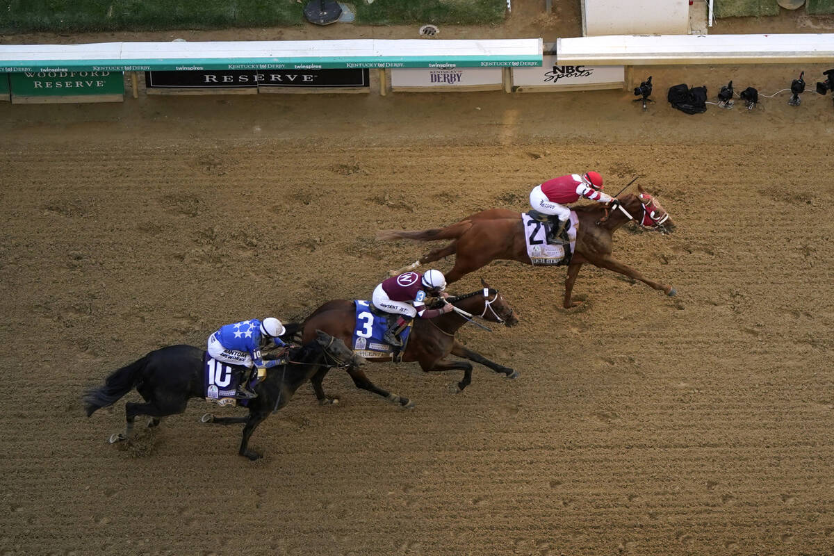 Rich Strike (21), with Sonny Leon aboard, beats Epicenter (3), with Joel Rosario aboard, and Za ...