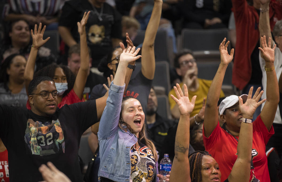 Aces fans cheer for Las Vegas during a WNBA basketball game against the Seattle Storm on Sunday ...