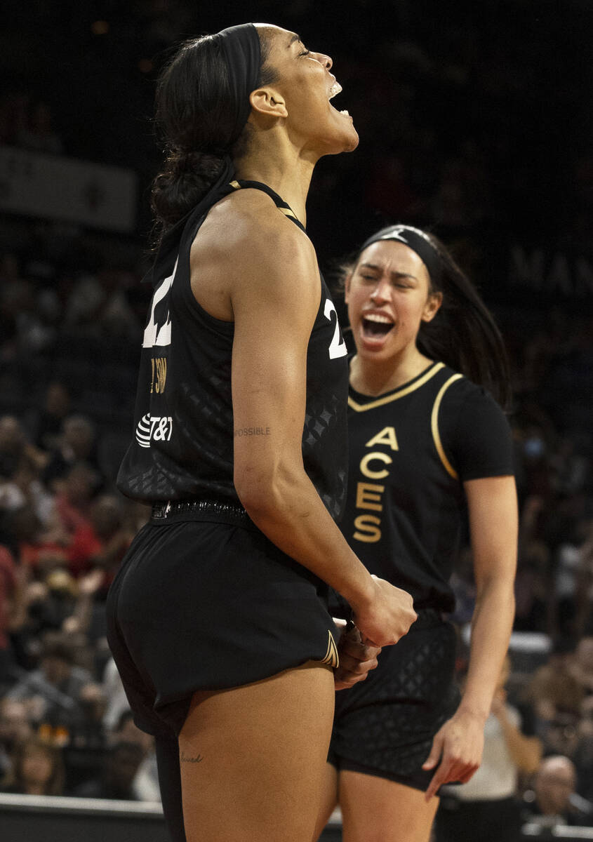 Aces forward A'ja Wilson (22) celebrates a big play in the first half of a WNBA basketball game ...