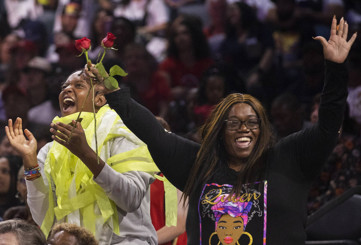 Aces fans cheer for Las Vegas during a WNBA basketball game against the Seattle Storm on Sunday ...