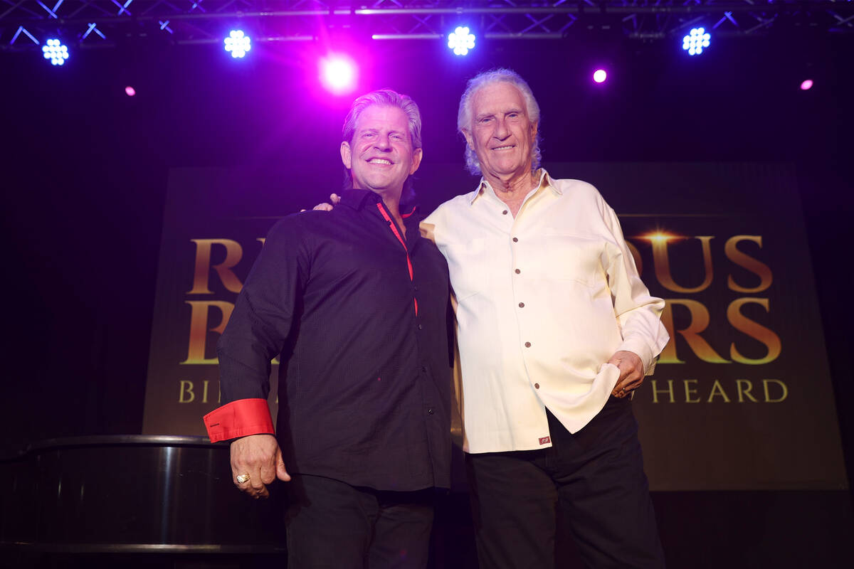 Bucky Heard, left, and Bill Medley of the Righteous Brothers pose for a photo after participati ...