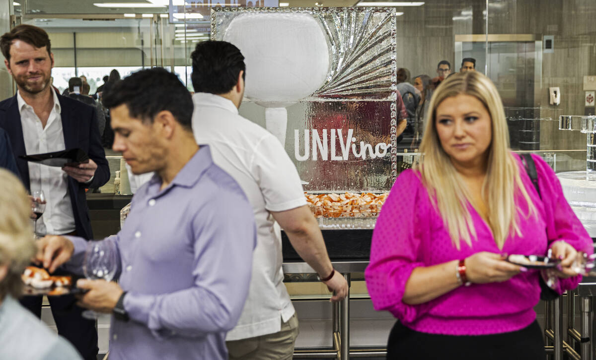 Guests enjoy wine and food tasting at UNLVino on Saturday, May 7, 2022, at UNLV College of Hosp ...