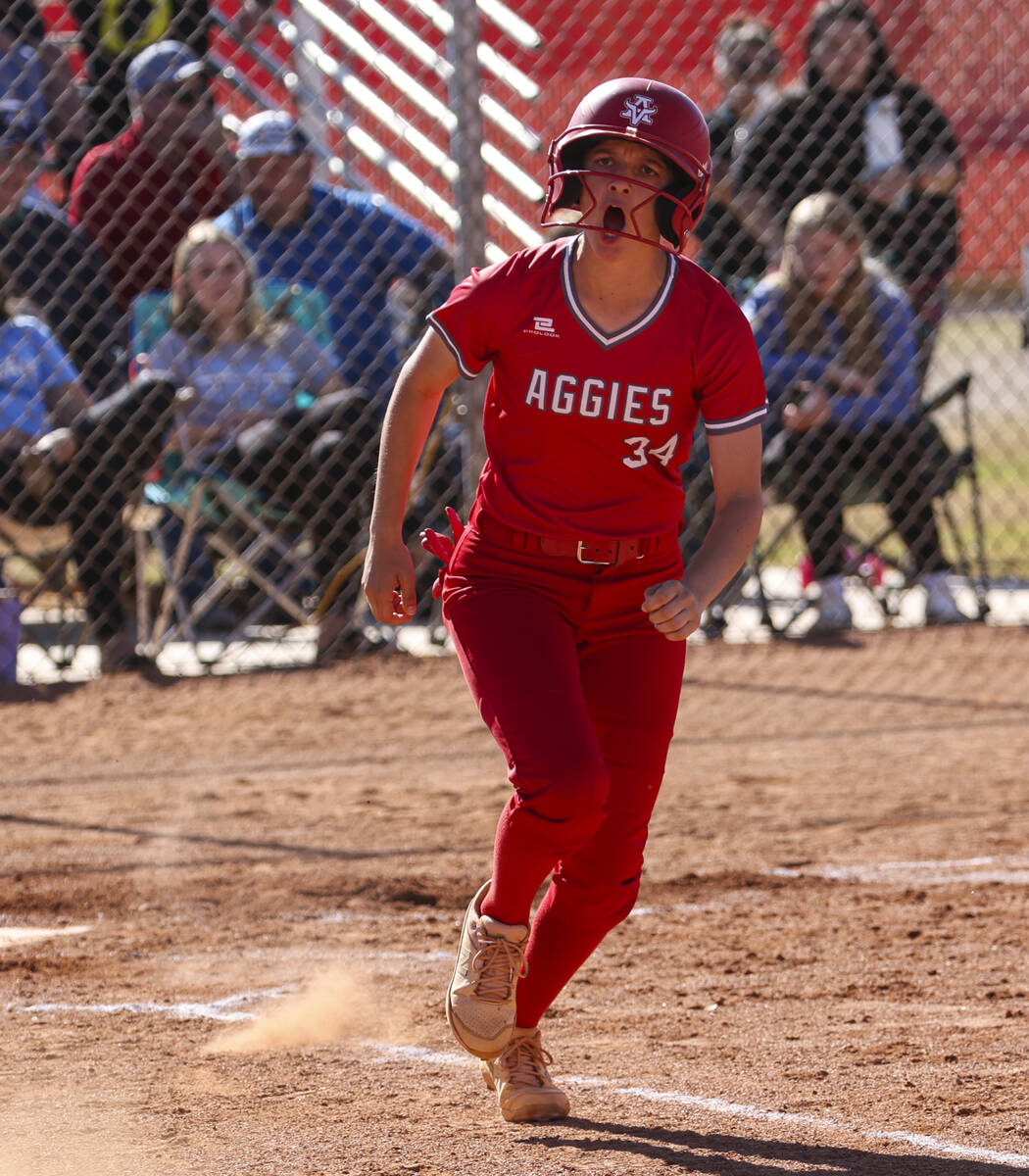 Arbor View's Makena Strong (34) celebrates after her hit against Centennial during a softball g ...