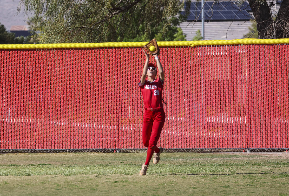 Arbor View's Micaela Resler (21) catches a fly ball from Centennial during a softball game in t ...