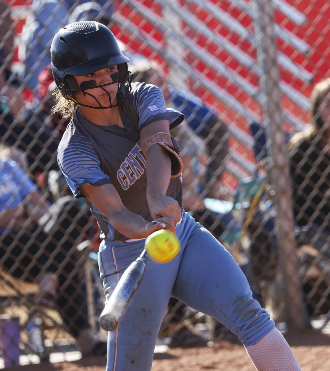 Centennial's Ashley Madonia (3) hits the ball against Arbor View during a softball game in the ...