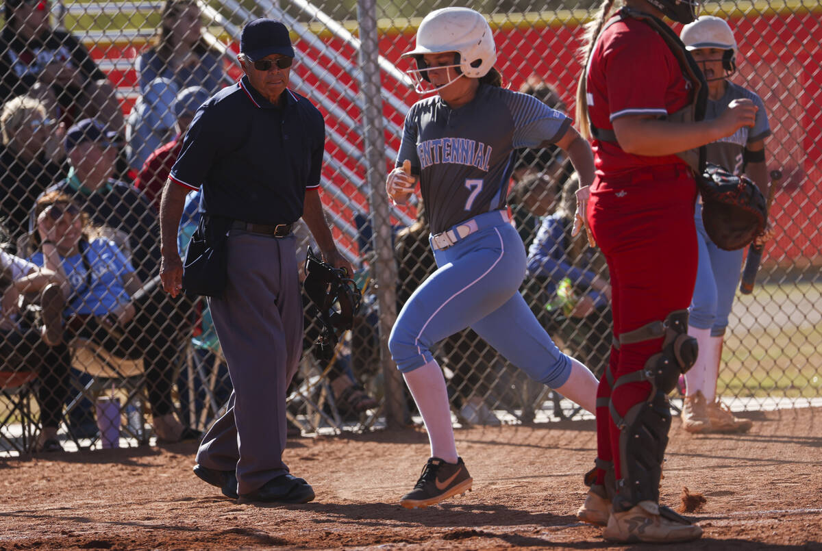 Centennial's Pence Justice (7) scores a run against Arbor View during a softball game in the Cl ...