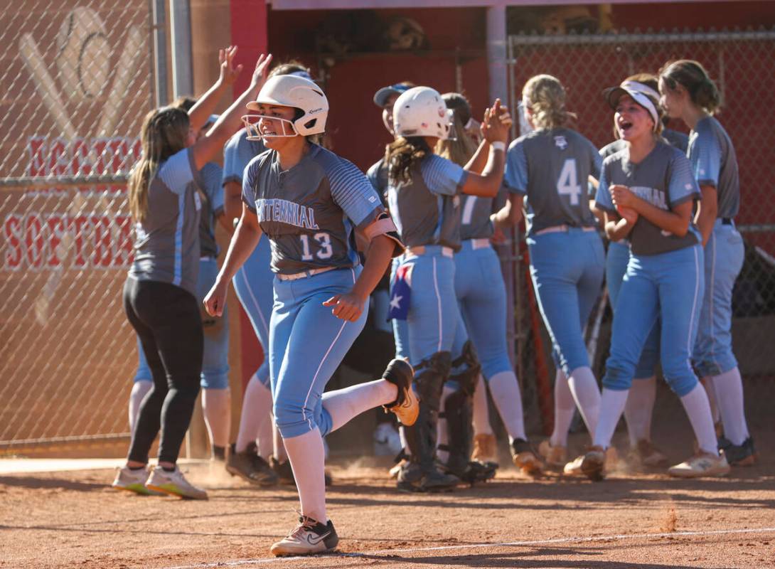 Centennial's Keana Bell (13) looks to score a run against Arbor View during a softball game in ...