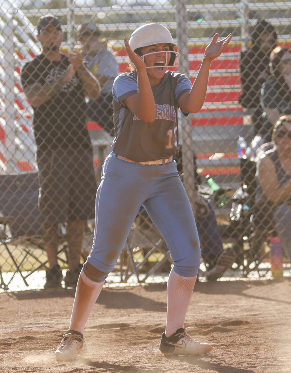 Centennial's Keana Bell (13) celebrates after scoring a run against Arbor View during a softbal ...