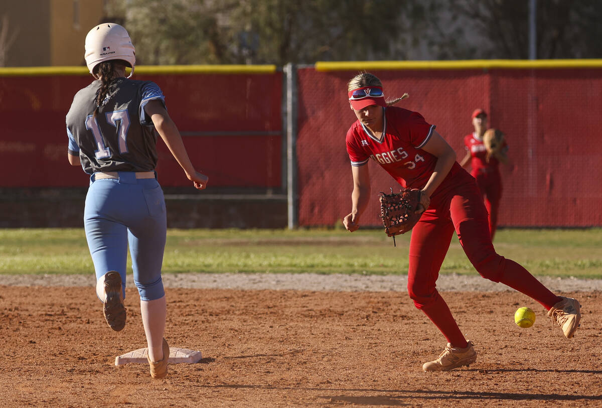 Centennial's Liliana Palmeri (17) heads for second base against Arbor View's Makena Strong (34) ...