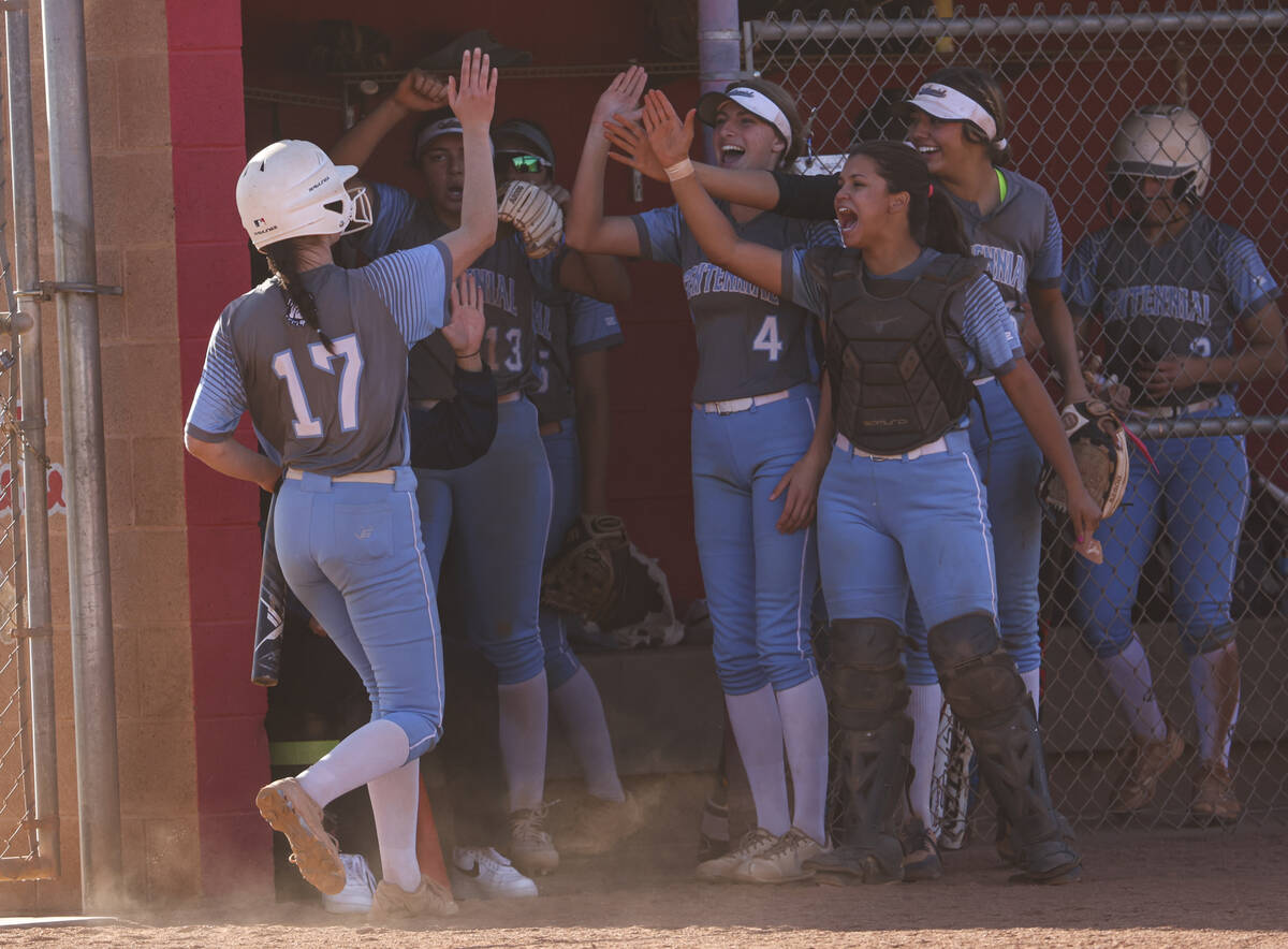 Centennial's Liliana Palmeri (17) celebrates her run with teammates during a softball game in t ...