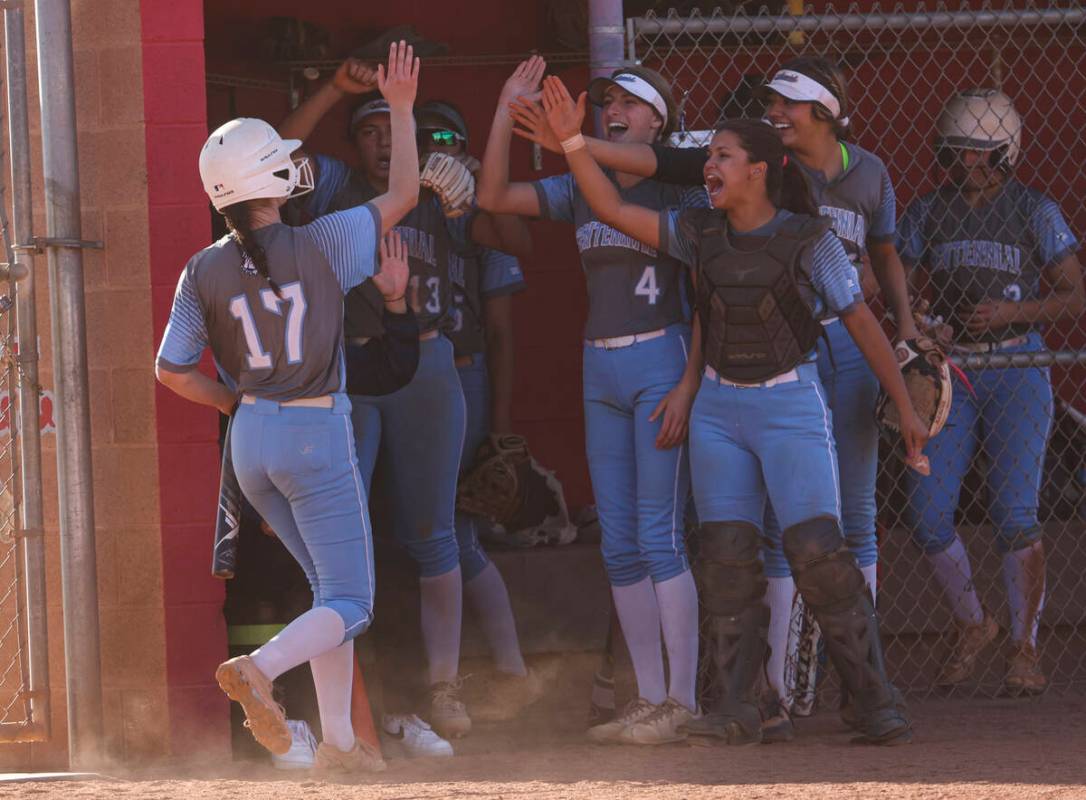 Centennial's Liliana Palmeri (17) celebrates her run with teammates during a softball game in t ...