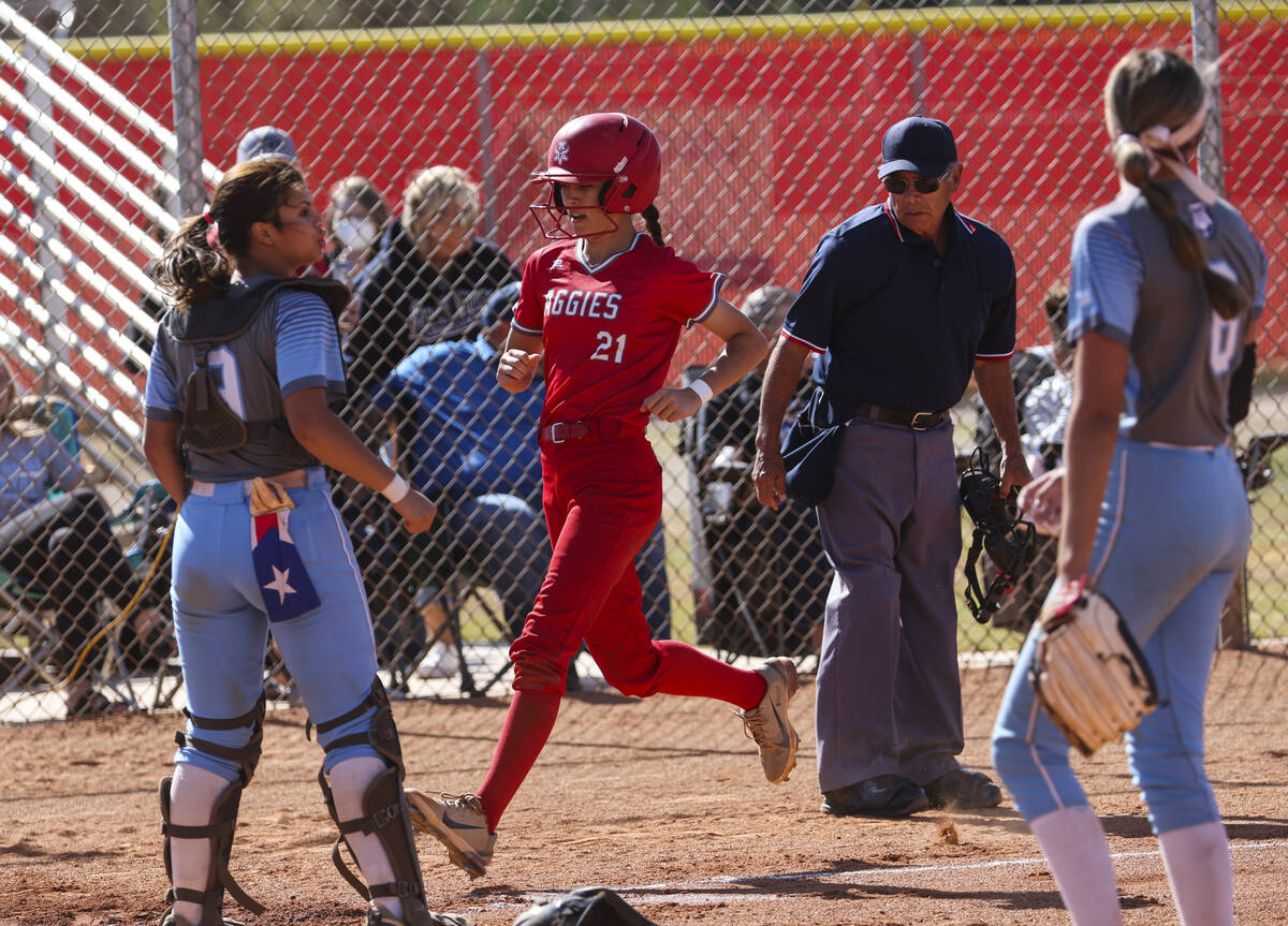 Arbor View's Micaela Resler (21) scores a run against Centennial during a softball game in the ...