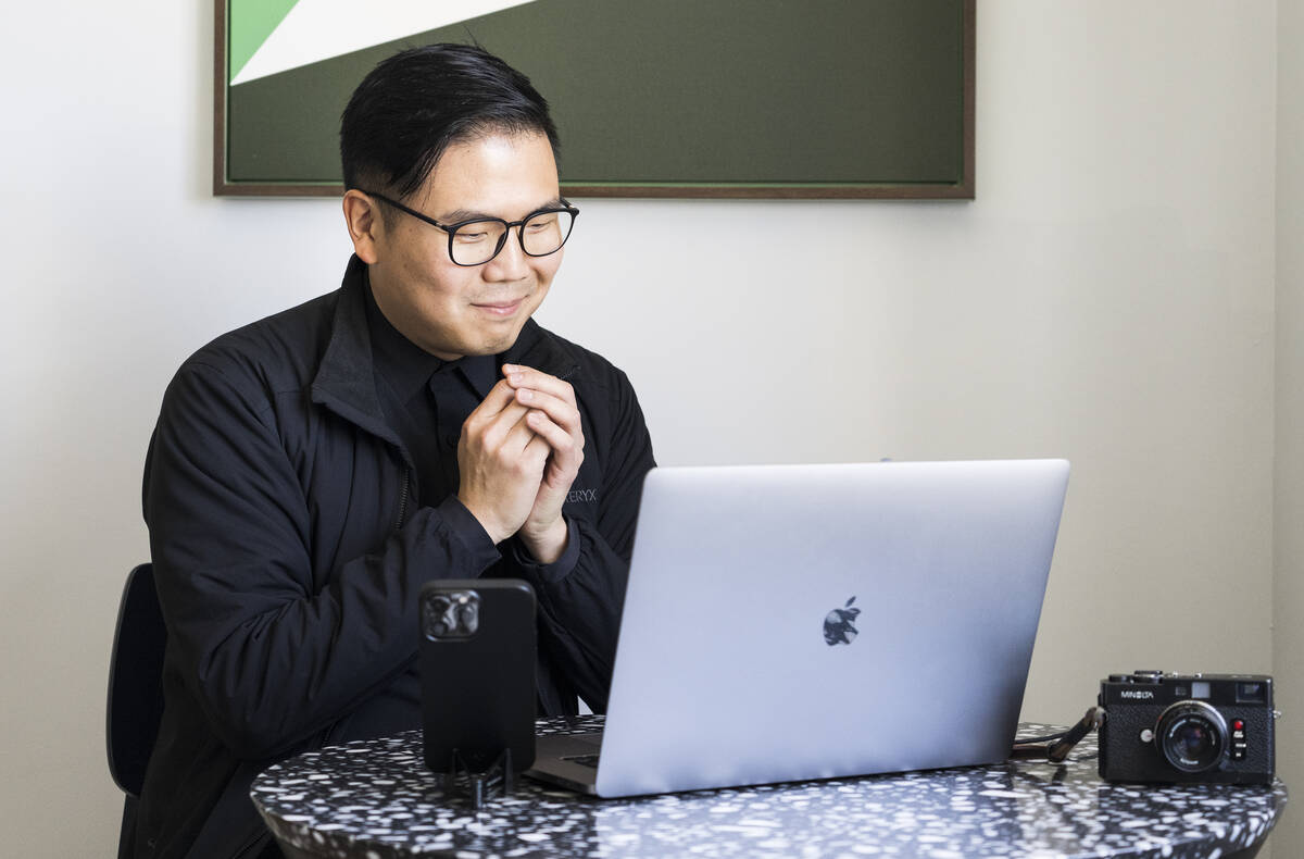 Los Angeles Times foreign correspondent and staff photographer Marcus Yam learns he won the 202 ...