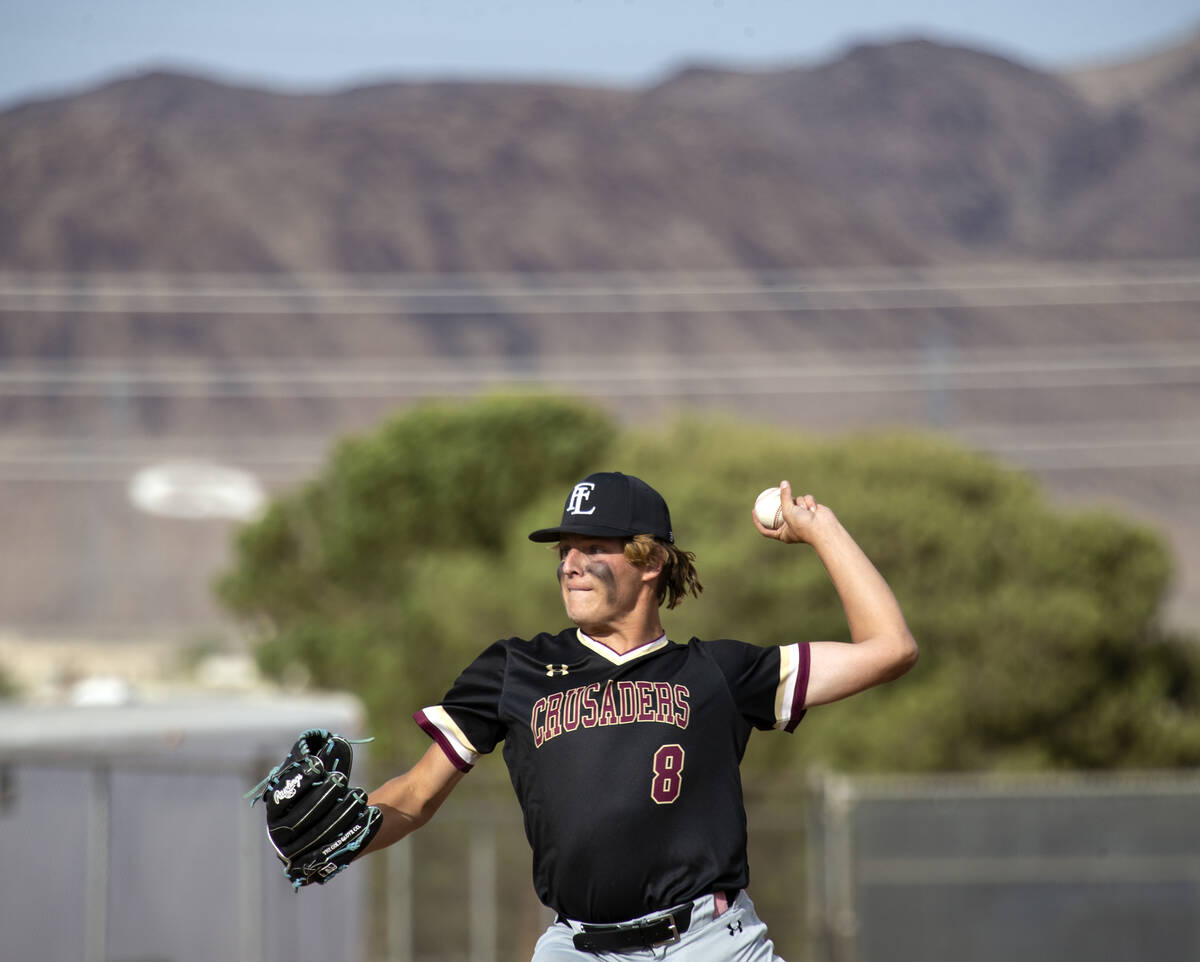 Faith Lutheran pitcher William Sullivan throws to Basic during a Class 5A Southern Region high ...