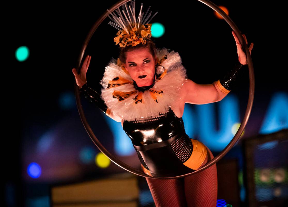 An aerialist performs during the second day of the Electric Daisy Carnival at the Las Vegas Mot ...