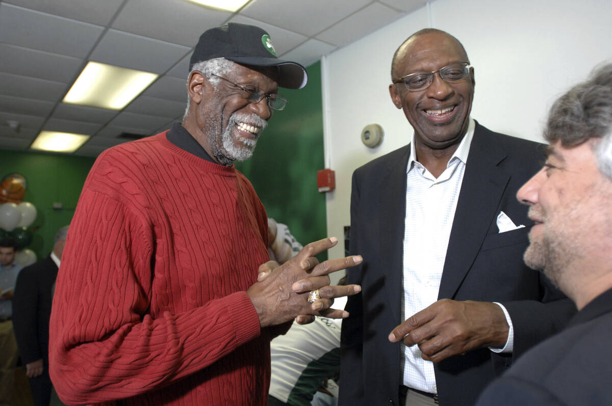 FILE -Former NBA players Bill Russell, left, and Bob Lanier share a laugh during the ceremonial ...