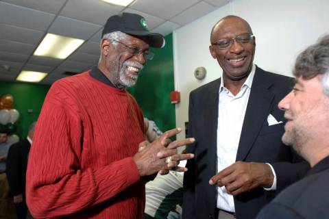 FILE -Former NBA players Bill Russell, left, and Bob Lanier share a laugh during the ceremonial ...