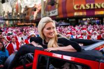 Holly Madison serves as grand marshal of the Las Vegas Great Santa Run in downtown Las Vegas on ...