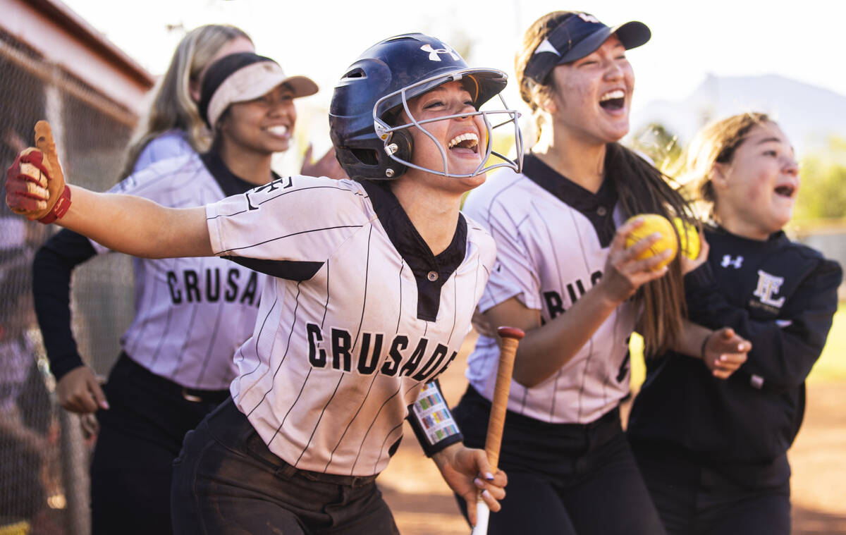 Faith Lutheran’s Emily Sholeff (6) celebrates with teammates after the Crusaders scored ...