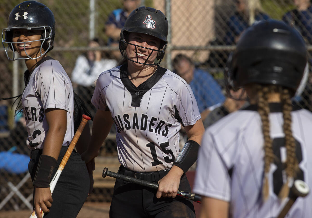 Faith Lutheran’s Savannah Moore (15) celebrates with teammates after scoring during the ...