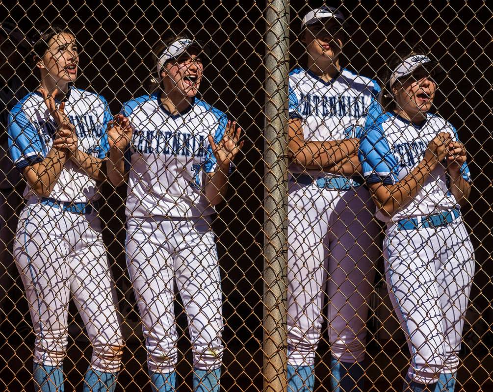 Centennial players cheer during the girls Class 5A Southern Region tournament softball game aga ...