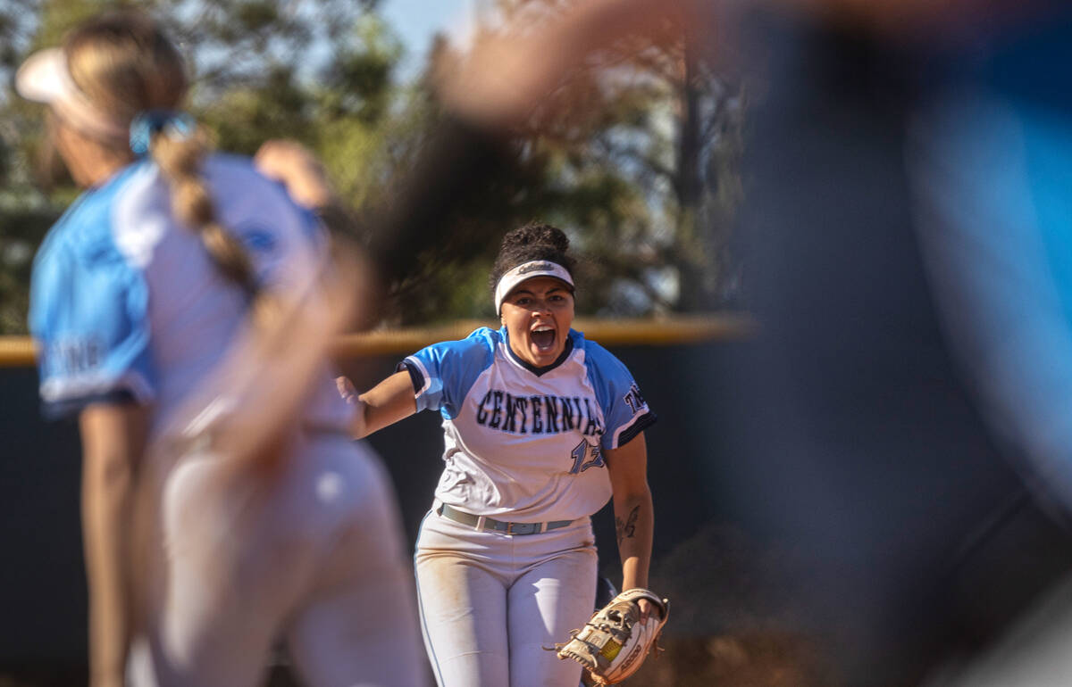 Centennial’s Keana Bell (13) celebrates a big defensive play during the girls Class 5A S ...