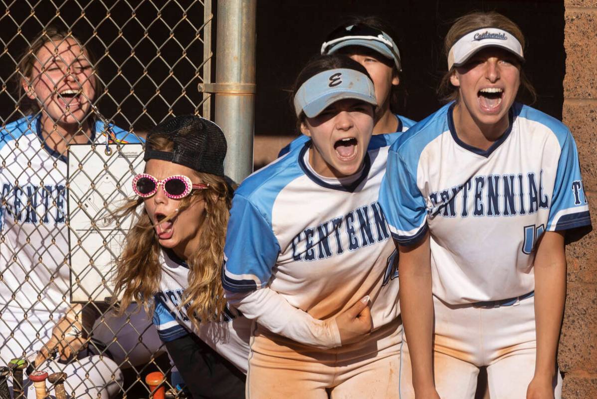 Centennial players cheer during the girls Class 5A Southern Region tournament softball game aga ...