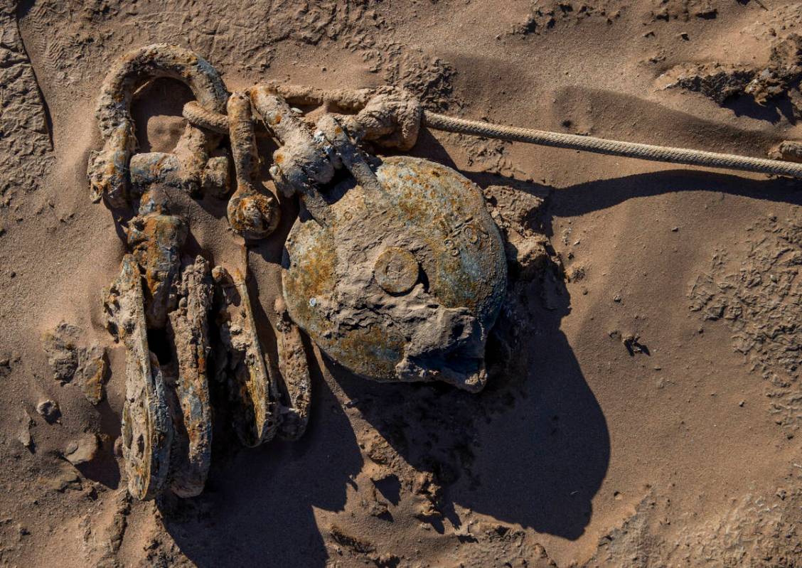 Abandoned boat parts are revealed as the waterline recedes in Callville Bay along the shoreline ...