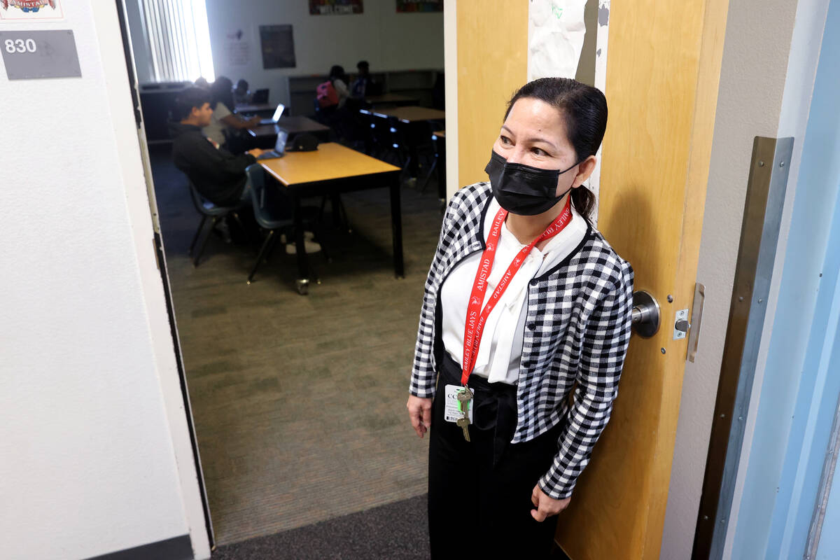 Bailey Middle School teacher Desirie Napa waits for her students at the Las Vegas school Wednes ...