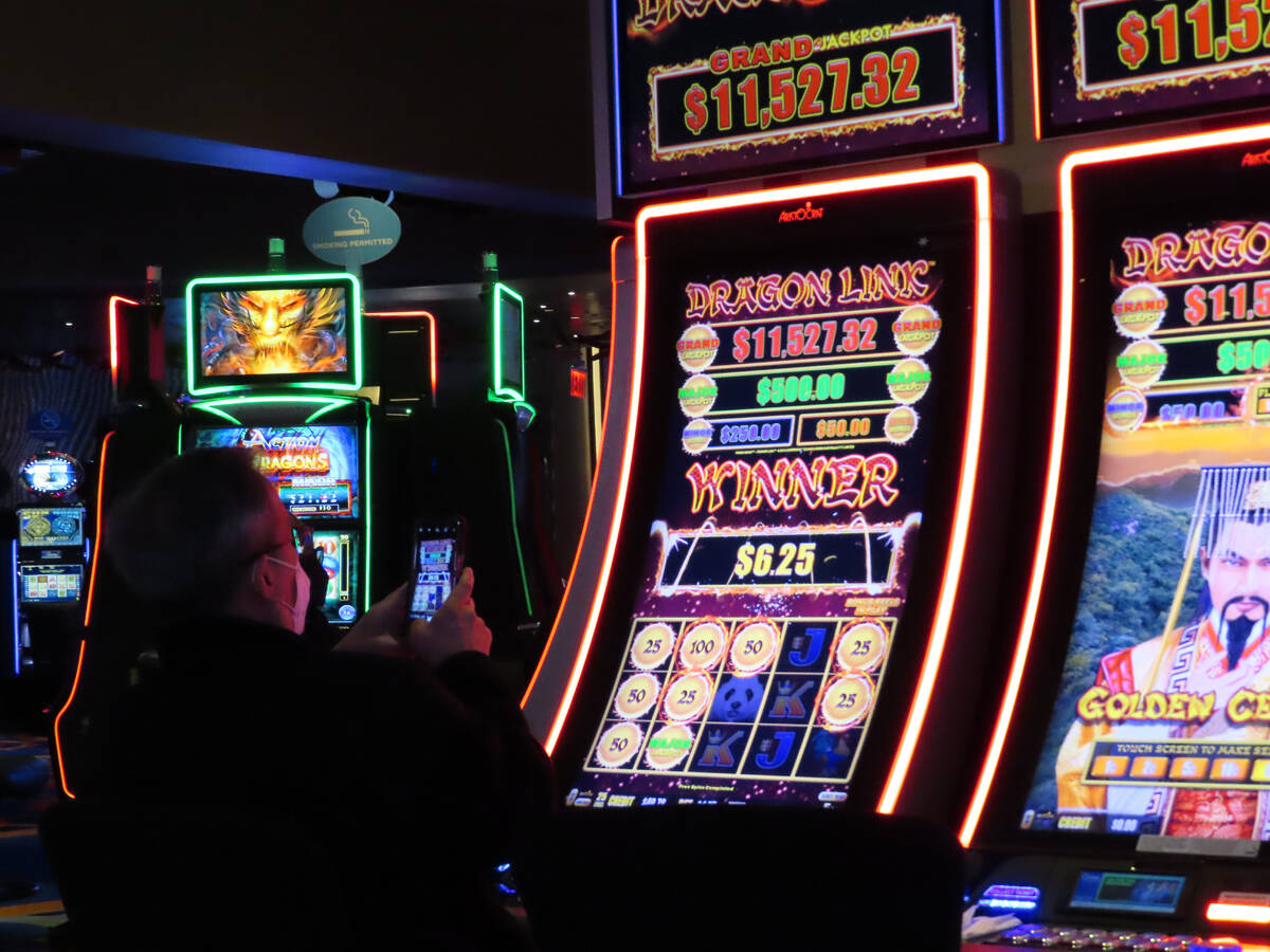 A gambler wins at a slot machine at the Ocean Casino Resort in Atlantic City, N.J., Feb. 10, 20 ...