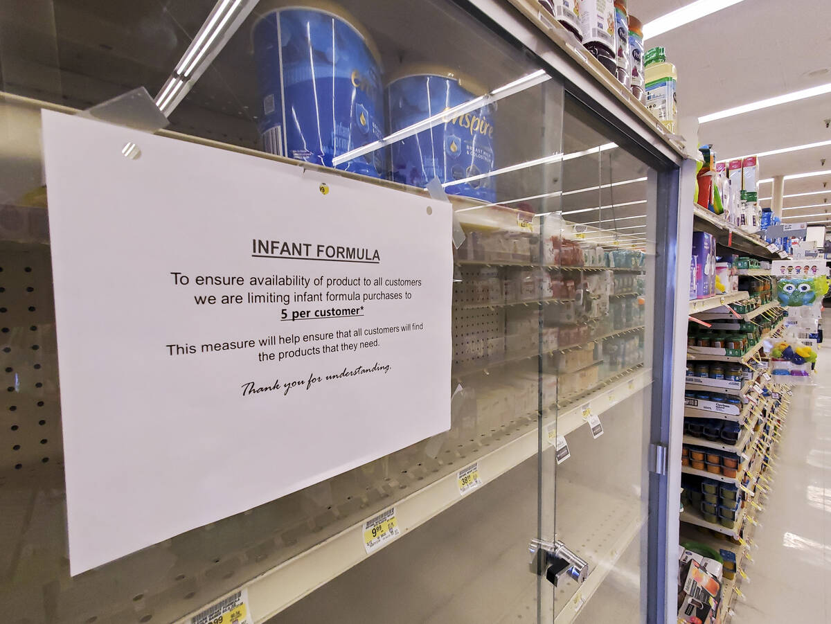 Near-empty shelves of baby formula are seen at an Albertsons grocery store on Thursday, May 12, ...