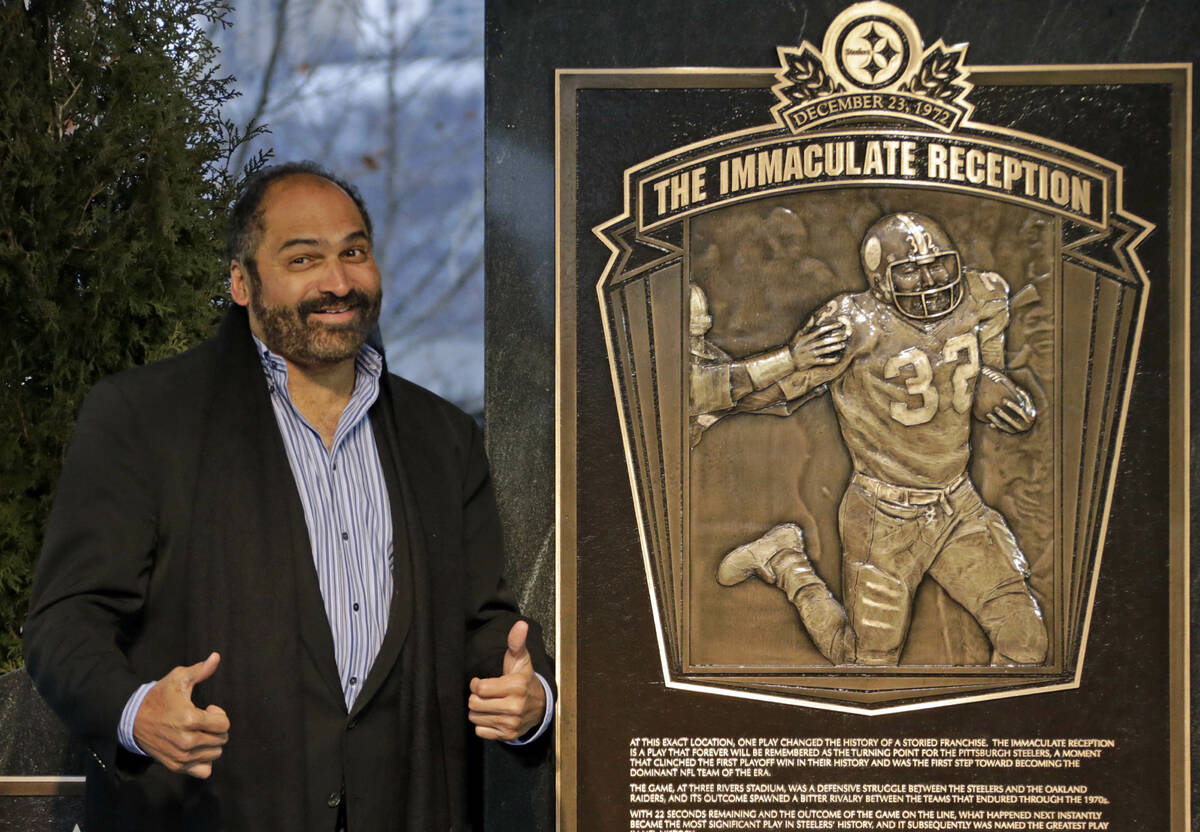 Hall of Fame running back, Pittsburgh Steelers' Franco Harris stands on the spot of the "I ...