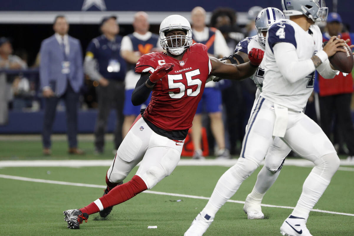 FILE - Arizona Cardinals outside linebacker Chandler Jones (55) rushes Dallas Cowboys quarterba ...