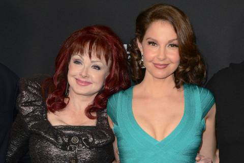 FILE - Naomi Judd, left, and Ashley Judd arrive at the LA premiere of "Olympus Has Fallen& ...