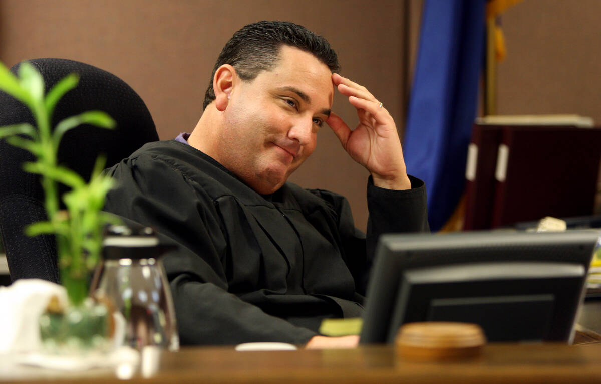 Family Court Judge William Voy listens to a teenage girl's testimony in his courtroom on March ...