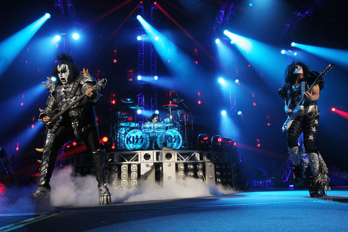 Members of the band Kiss, from left, Gene Simmons, Eric Singer and Paul Stanley perform at The ...