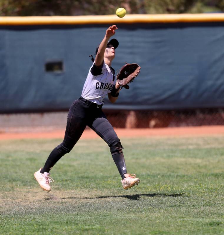 Faith Lutheran outfielder Sydney Schafer (9) fields a hit in the 2nd inning in a Class 5A South ...