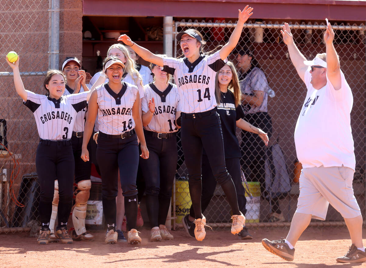 Faith Lutheran players celebrate beating Green Valley in their Class 5A Southern Region softbal ...