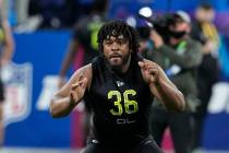 Memphis offensive lineman Dylan Parham runs a drill during the NFL football scouting combine, F ...