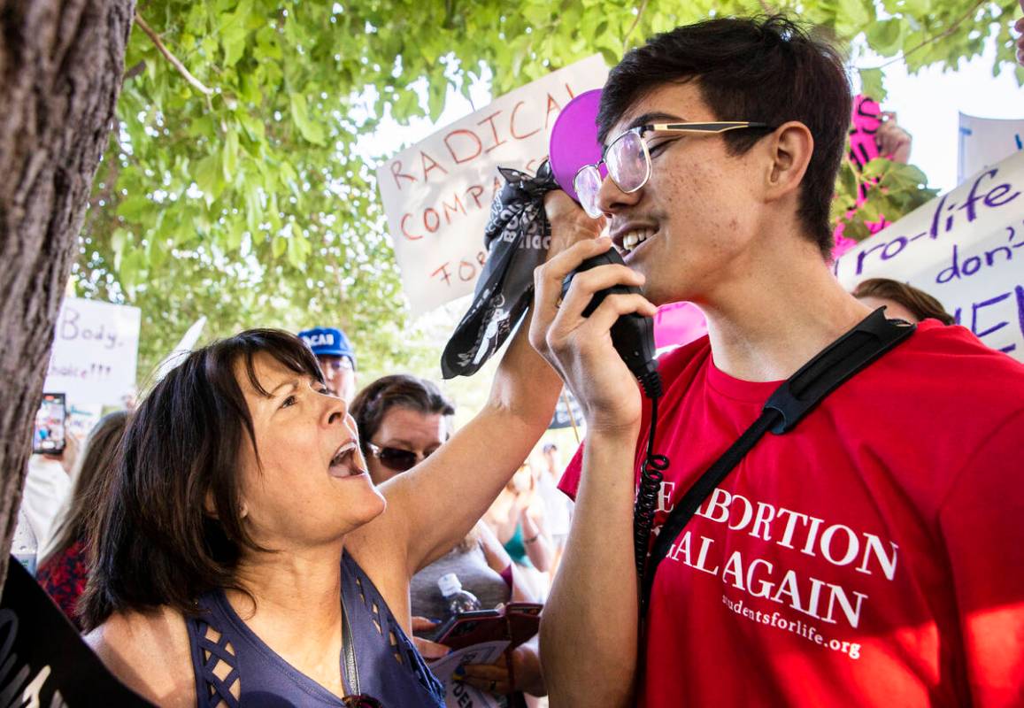 Demonstrator Patty Christensen, left, confronts an anti-abortion activist during a pro-abortion ...